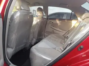 Toyota Corolla LE 4dr Sedan (1.8L 4cyl 4A) 2010 Red