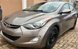 Hyundai Elantra GLS Sedan FWD (1.8L 4cyl 6A) 2013 Gold