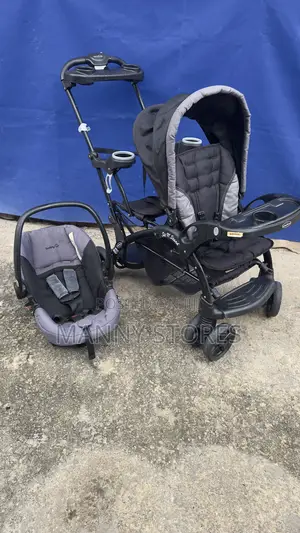 Photo - Twin Baby Stroller (With Baby Car Seat)