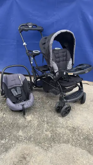 Photo - Twin Stroller (Sit N Stand) With Baby Car Seat