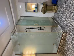 Shower Cubicle With Gold Accesories