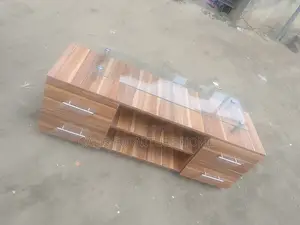 4ft Tv Stand. Brown Color With Glass Top