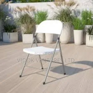 Foldable Chair With Metal Legs White Colour.