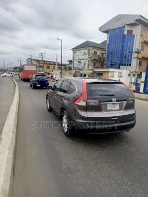 A Plot of Land Facing Lagos Road With Ten Shops