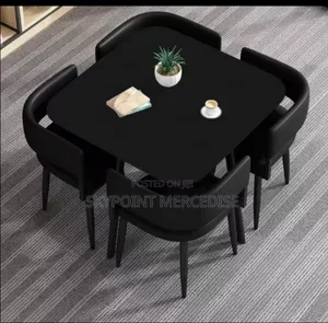 A Set of Dinny Chairs and Table