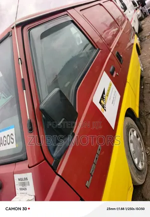 Mitsubishi L300 2004 Red