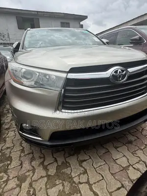 Toyota Highlander Limited V6 4x4 (3.5L 6cyl 6A) 2016 Gold
