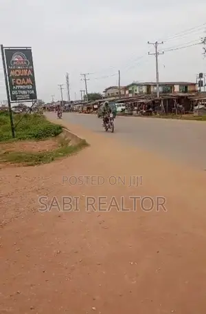 Functional Filling Station on 2 Plots of Land Along Sngo Ijoko Road