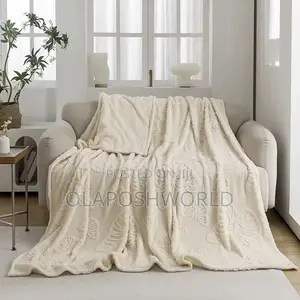 Creamy Posh Drape Sofa Blanket