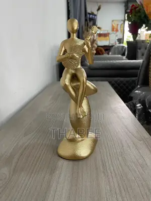 Guitar Man Gold Abstract Figurine