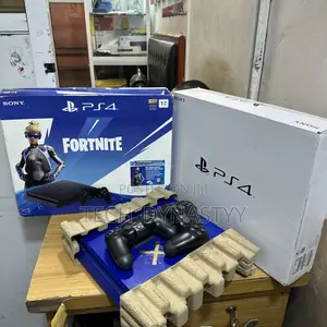 Sony Ps4 Slim With 2 Controllers and 10 Games