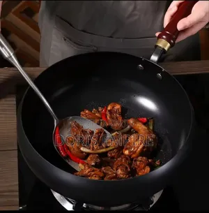 Non-Stick Frying Wok Pan Multifunctional Iron Pan Gas Stove.