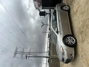 Toyota Avalon XLE Touring Sedan FWD (3.5L 6cyl 6A) 2013 Gold