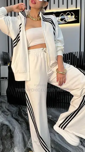 Bandeau Neckline (Strapless Tube Top) Under a Zip-Up Track Jacket.