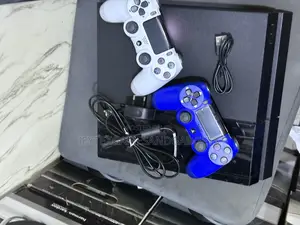London Used Ps 4 With Fc26 Included, 2 Pads and 12 Games Installed