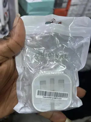 Original Access" Wall Charger, Likely for an Apple Device