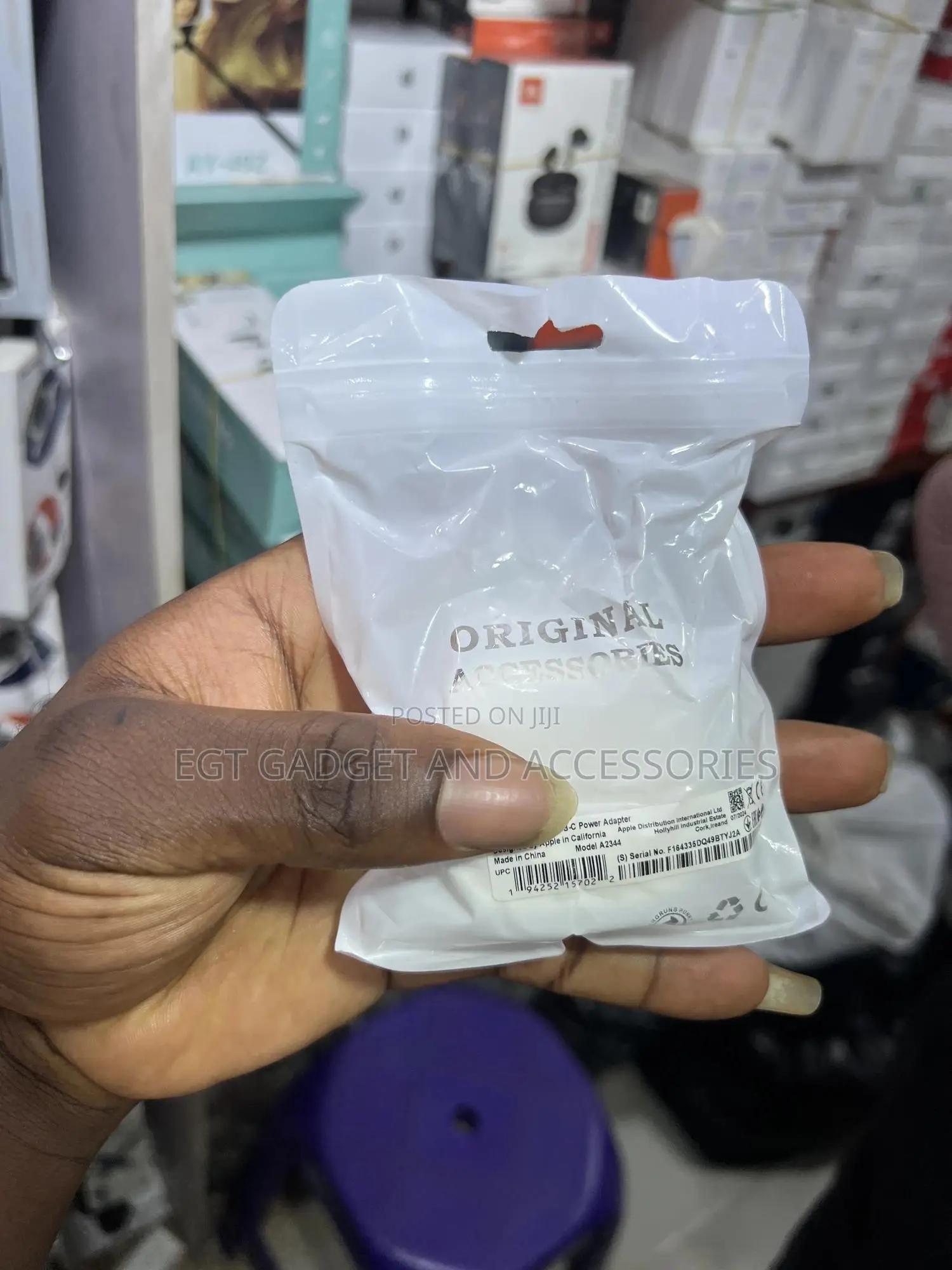 Original Access" Wall Charger, Likely for an Apple Device