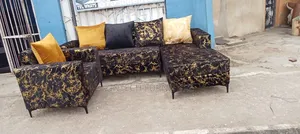 L Shape Sofas and a Single Seater With Pillows