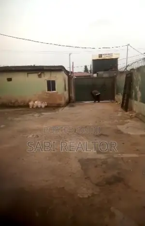 2 Plots of Land With Warehouse and 12 Shops Along a Major Road