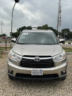 Toyota Highlander XLE V6 4x4 (3.5L 6cyl 6A) 2016 Gold