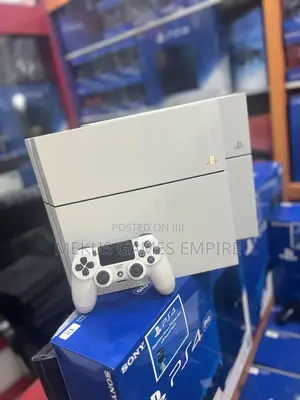 Ps4 Console + 9 Games Installed E.G Fc25,Car Race ,Gta,God of War,Cod