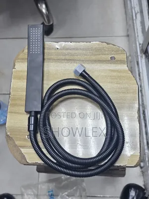 Black Handheld Showerhead With

A Hose