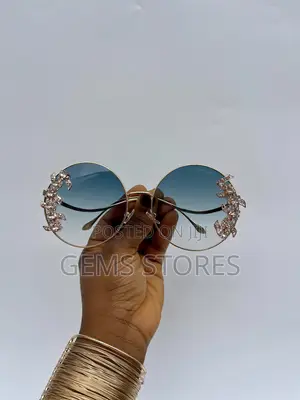 Luxurious Round Sunglasses With Rhinestone Butterfly Accents