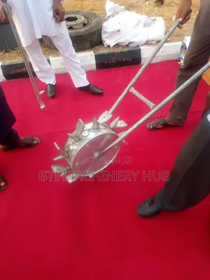 Manual Seed Planter With Fertilizers Spreader