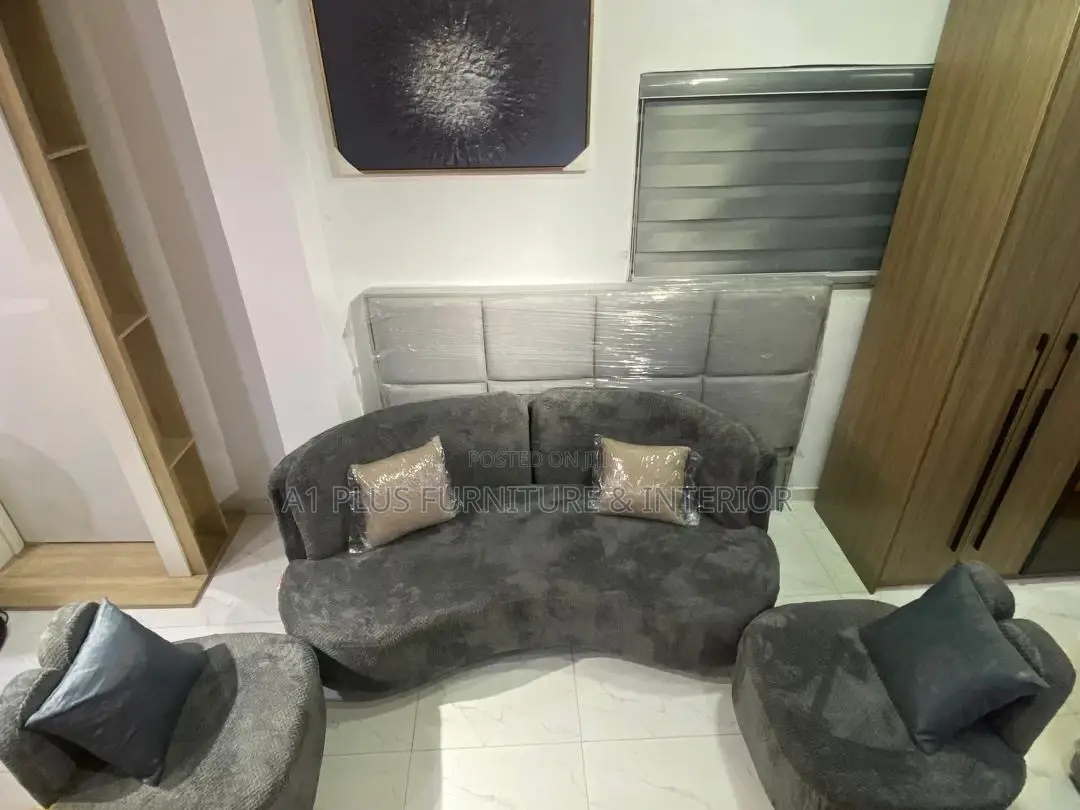 A Modern Wave-shaped Sofa Set In Plush Grey Fabric