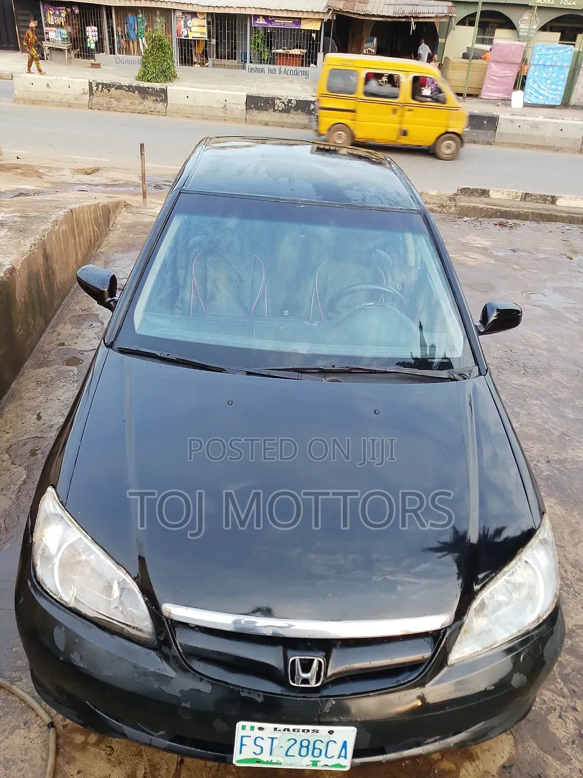 2002 Honda Civic DX 4dr Sedan (1.7L 4cyl 4A)