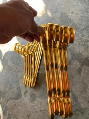 A Set Of Aluminum Gold Clothes Hangers