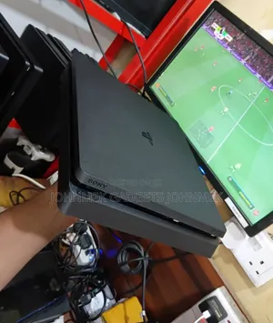 Ps4 Slim Uk With Two Pads and 10games Installed Fc 26 Package
