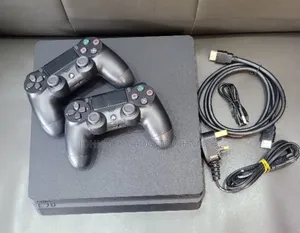 Play Station 4 Slim 500gb 9.00 With Two Pads and Game Installed