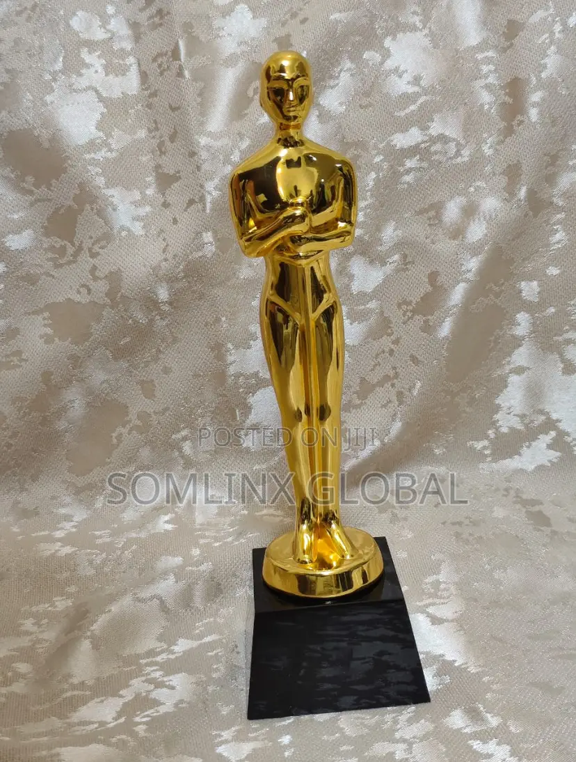 Gold Statue With Black Base