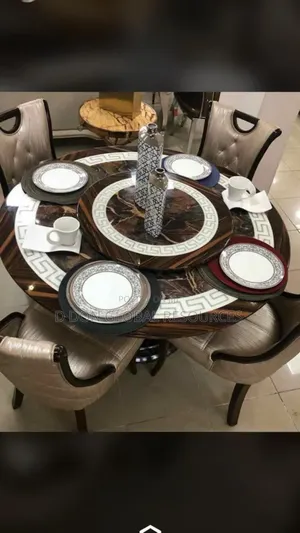 Round Dining Table by Six Seaters