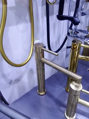 Long Range Brush Gold Basin Mixer