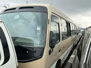 Toyota Coaster 2015 Gold