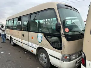 Toyota Coaster 2014 Gold