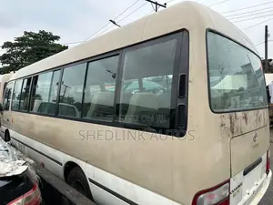 Toyota Coaster 2014 Gold