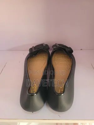 Lady (Baby Shoe)