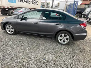 Honda Civic EX-L w/Navigation 2dr Coupe (1.8L 4cyl CVT) 2015 Gray