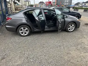 Honda Civic EX-L w/Navigation 2dr Coupe (1.8L 4cyl CVT) 2015 Gray