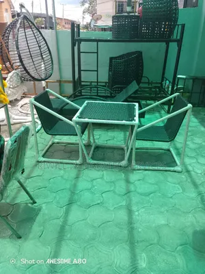 Rattan Table and Four Chairs