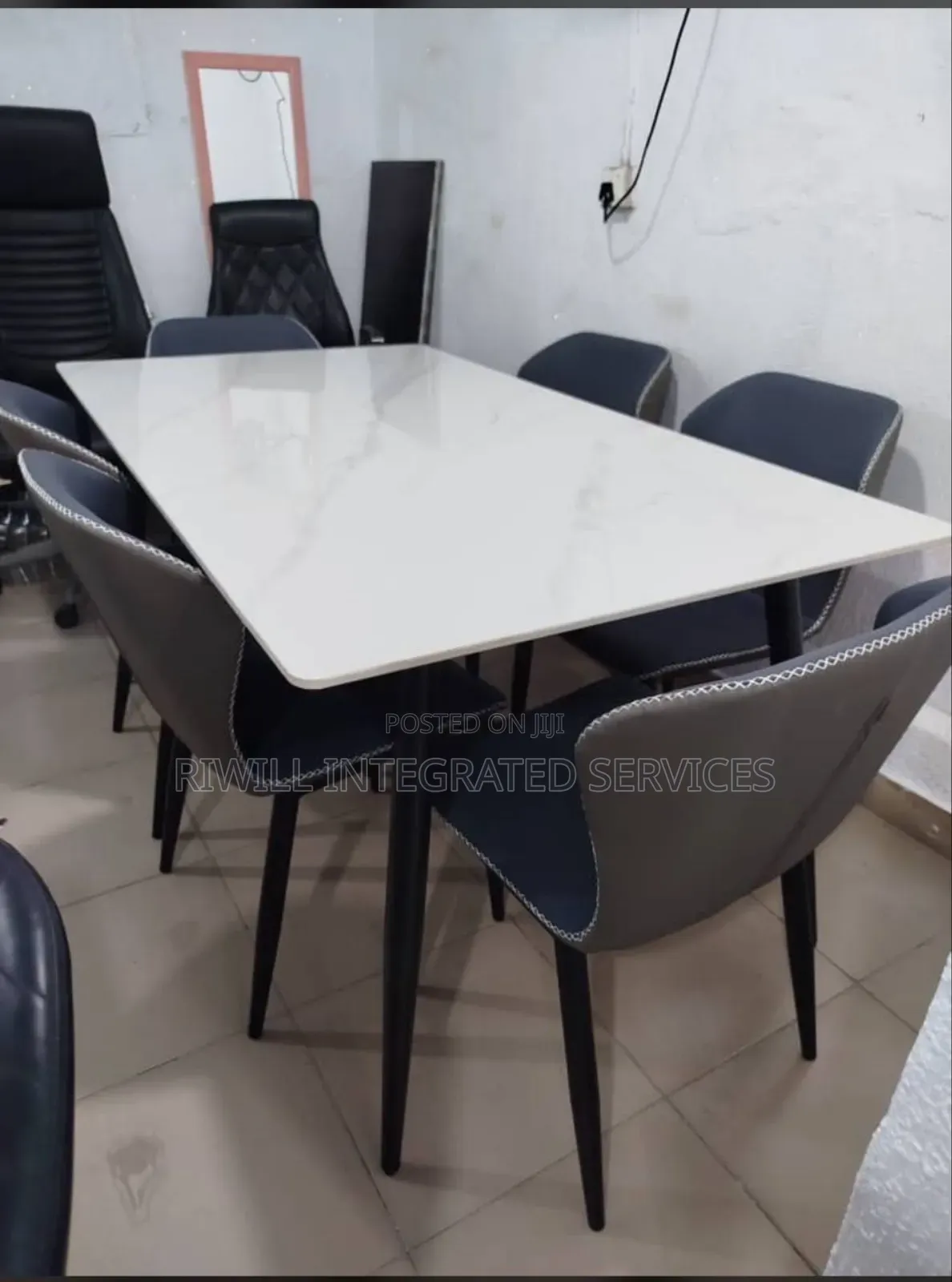 Dining Set With White Table and Multicolored Seats