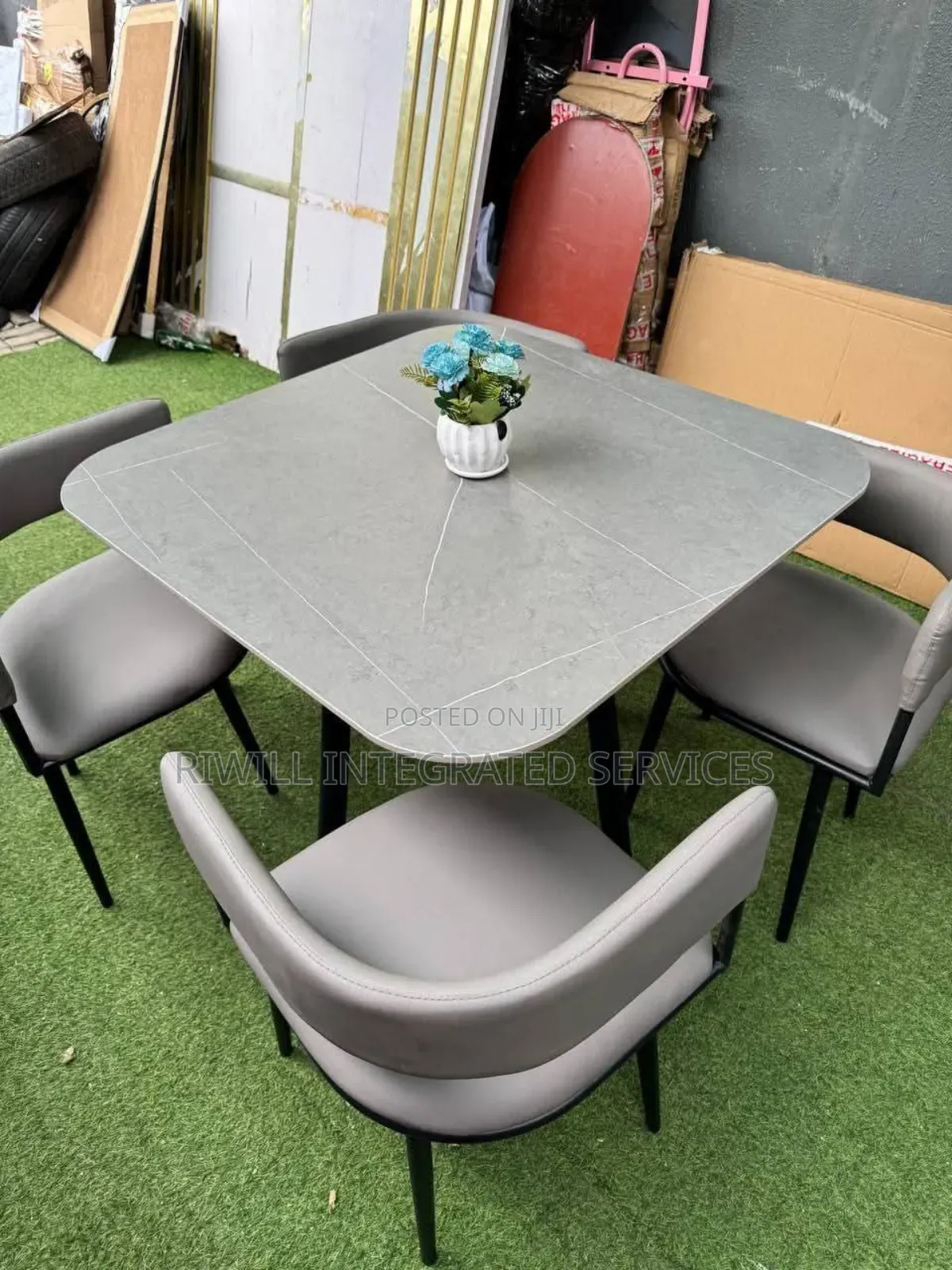 Grey Coloured Dining Set With Four Chairs