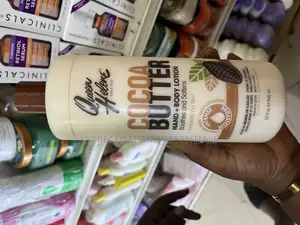 Queen Helene Cocoa Butter Hand + Body Lotion.
