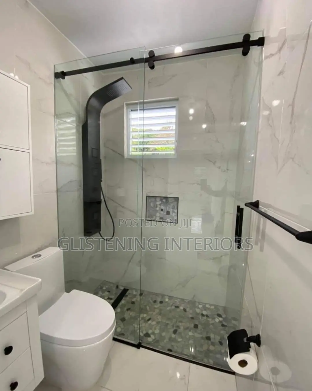 Sliding Shower Cubicles With A Black Accessories