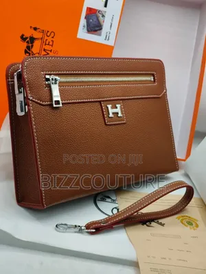 Original Hermes Heand Purse for Men Available in Store