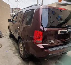 Honda Pilot EX-L 4dr SUV 4WD (3.5L 6cyl 5A) 2010 Burgundy