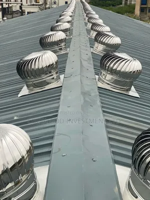 Multiple Roof Turbine Ventilators, Also Known as Whirlybird Vents.